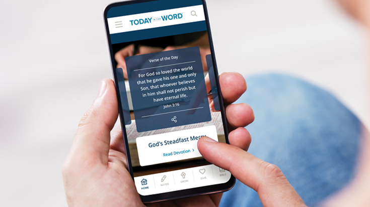 A Today in the Word reader uses the Mobile App to read the Verse of the Day and Daily Devotional